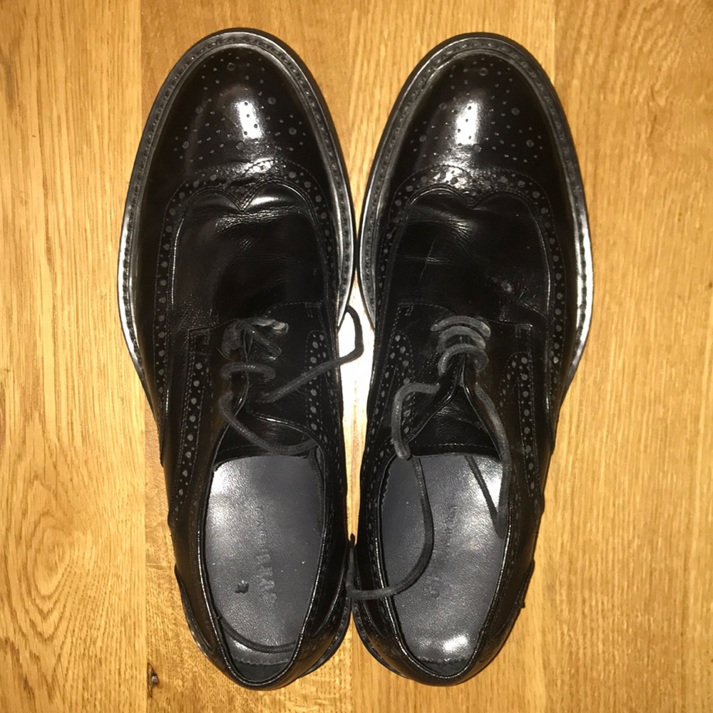 Black wing tip/ Brogue shoes.